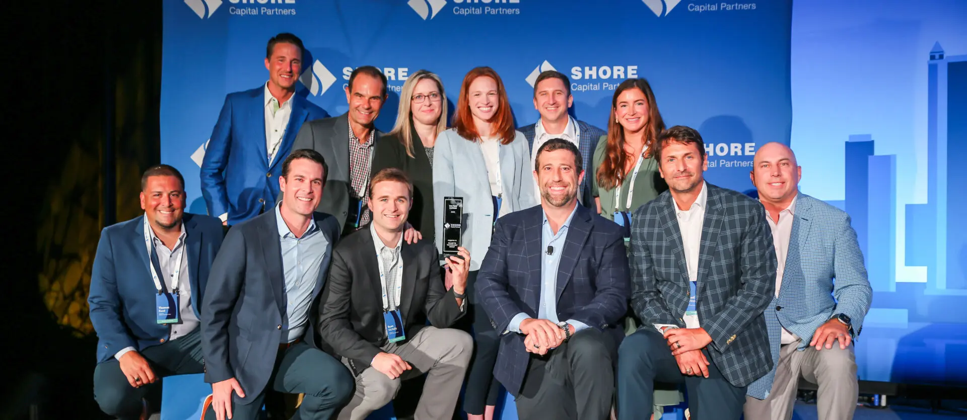 Operating Partner Team Poses for Award Photo with Justin Ishbia at Shore Capital Partners Executive Leadership Academy event